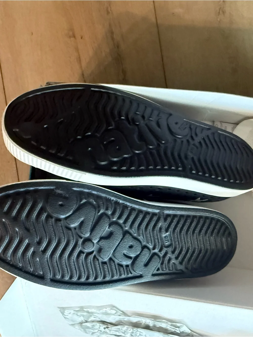Native Adult Shoes Jefferson Slip-On in Black with White Stars